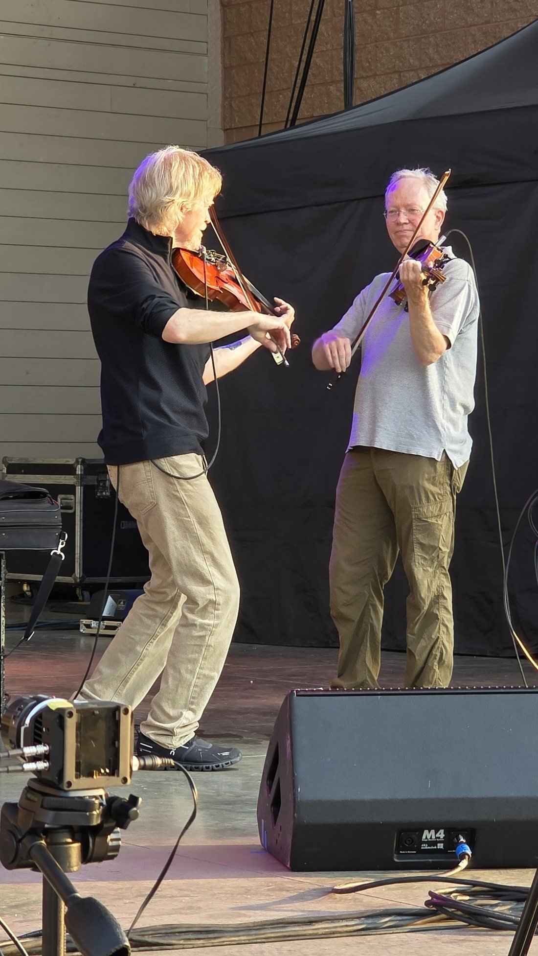 Kenny Putnam and Tom Schaeffer playing twin fiddles at the Levitt